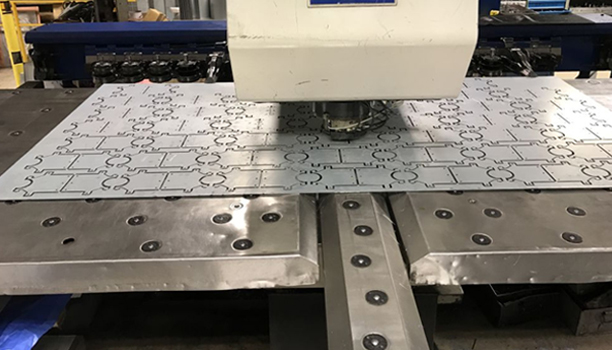 Read more about the article Revolutionizing Sheet Metal Fabrication: The CNC Turret Punch Press